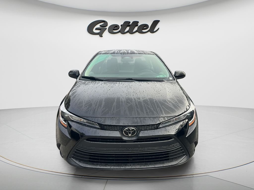 Used 2024 Black Toyota LE image 2