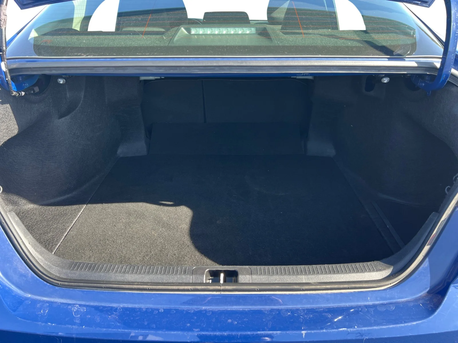 Used 2025 Reservoir Blue Toyota LE image 19