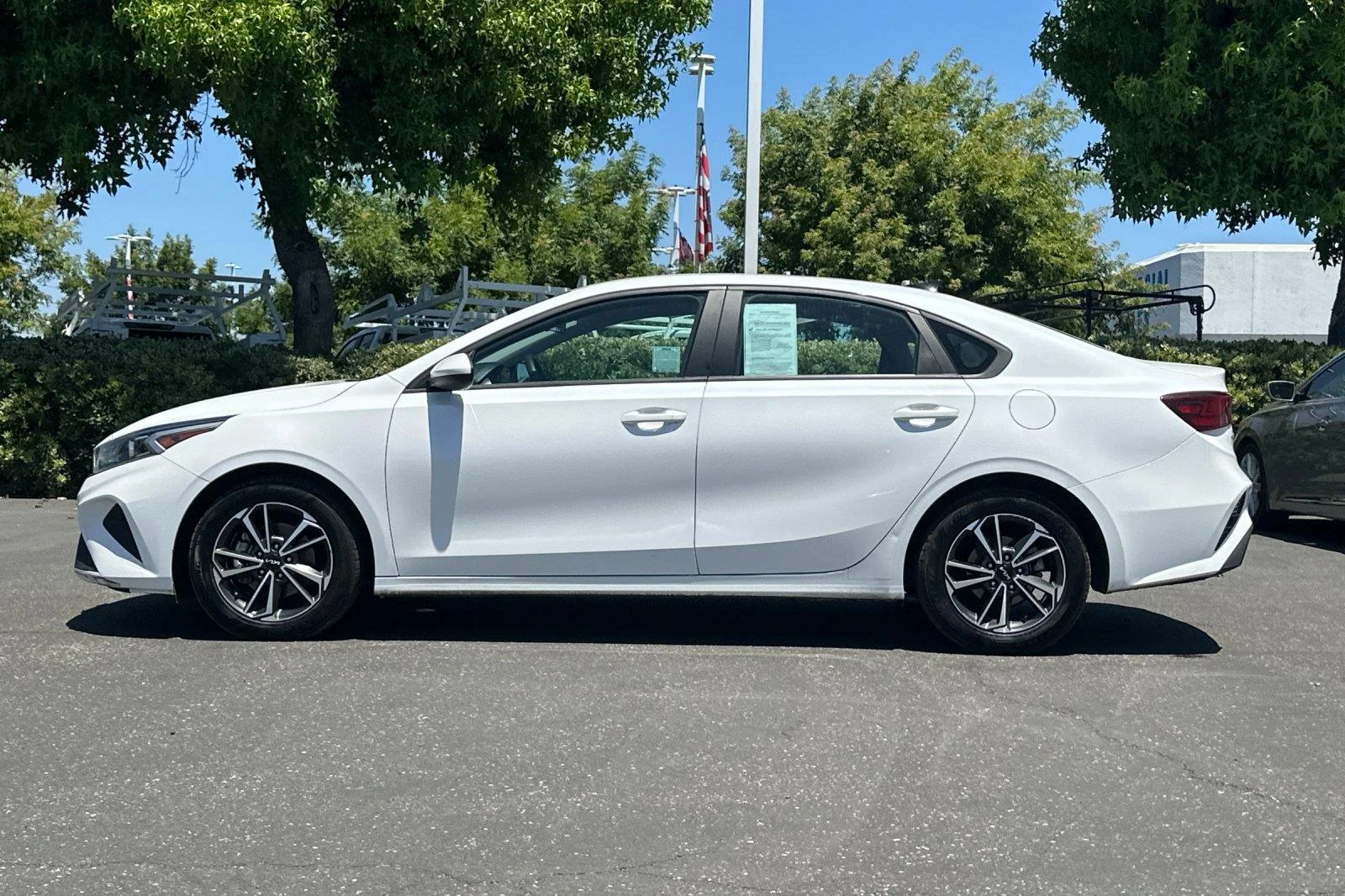 Used 2023 Snow White Pearl Kia LXS image 7