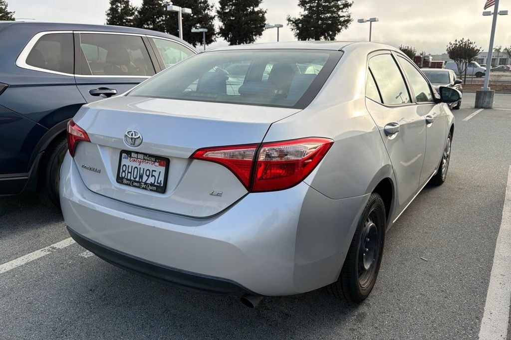 Used 2018 Classic Silver Metallic Toyota LE image 2