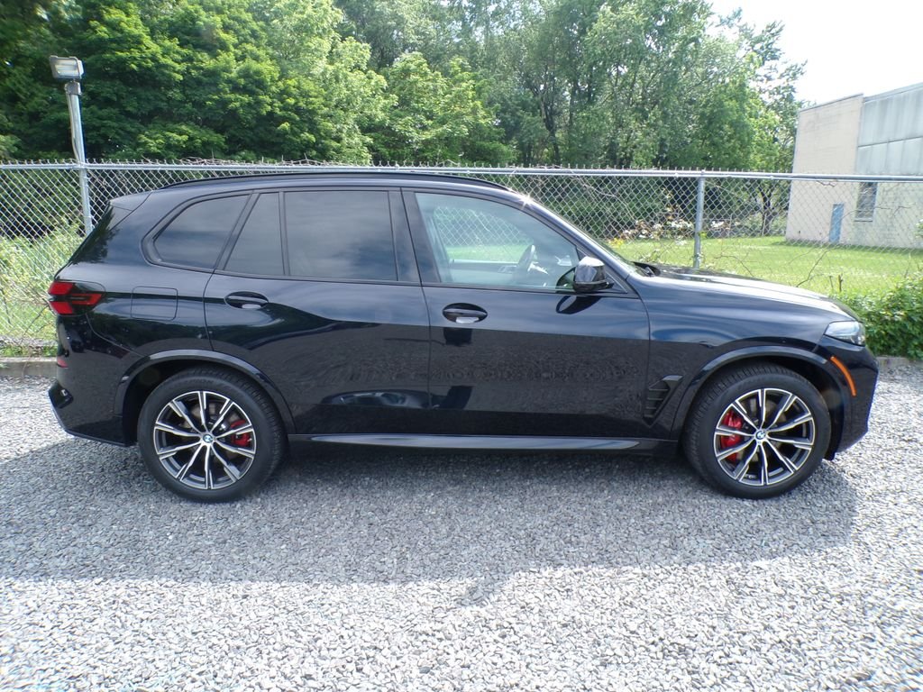 Certified Used 2024 Carbon Black Metallic BMW xDrive40i image 3