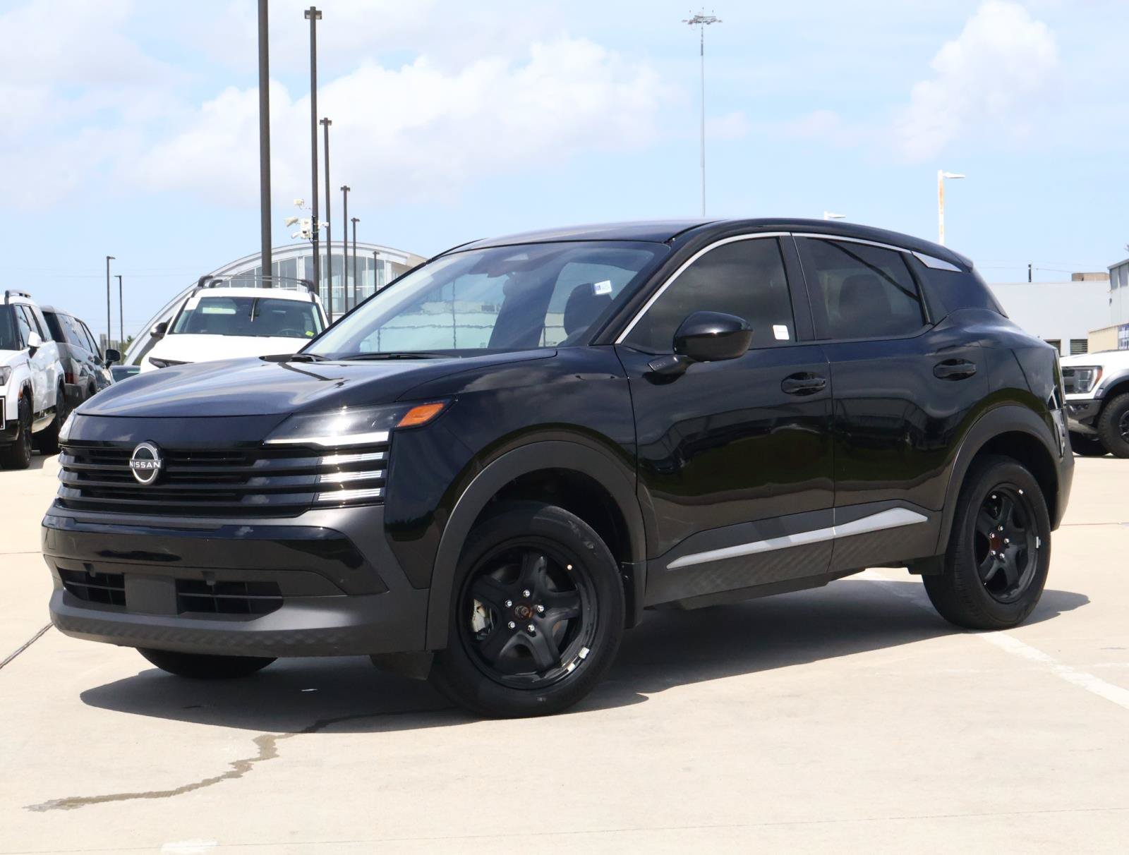 Used 2025 Super Black Nissan SV image 1