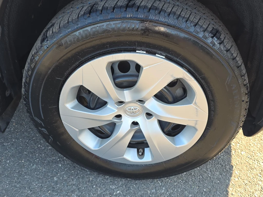 Used 2021 Super White Toyota LE image 19