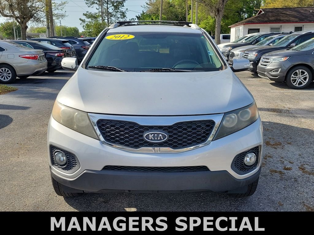 Used 2012 Kia Sorento EX with VIN 5XYKU4A25CG201430 for sale in St. Augustine, FL