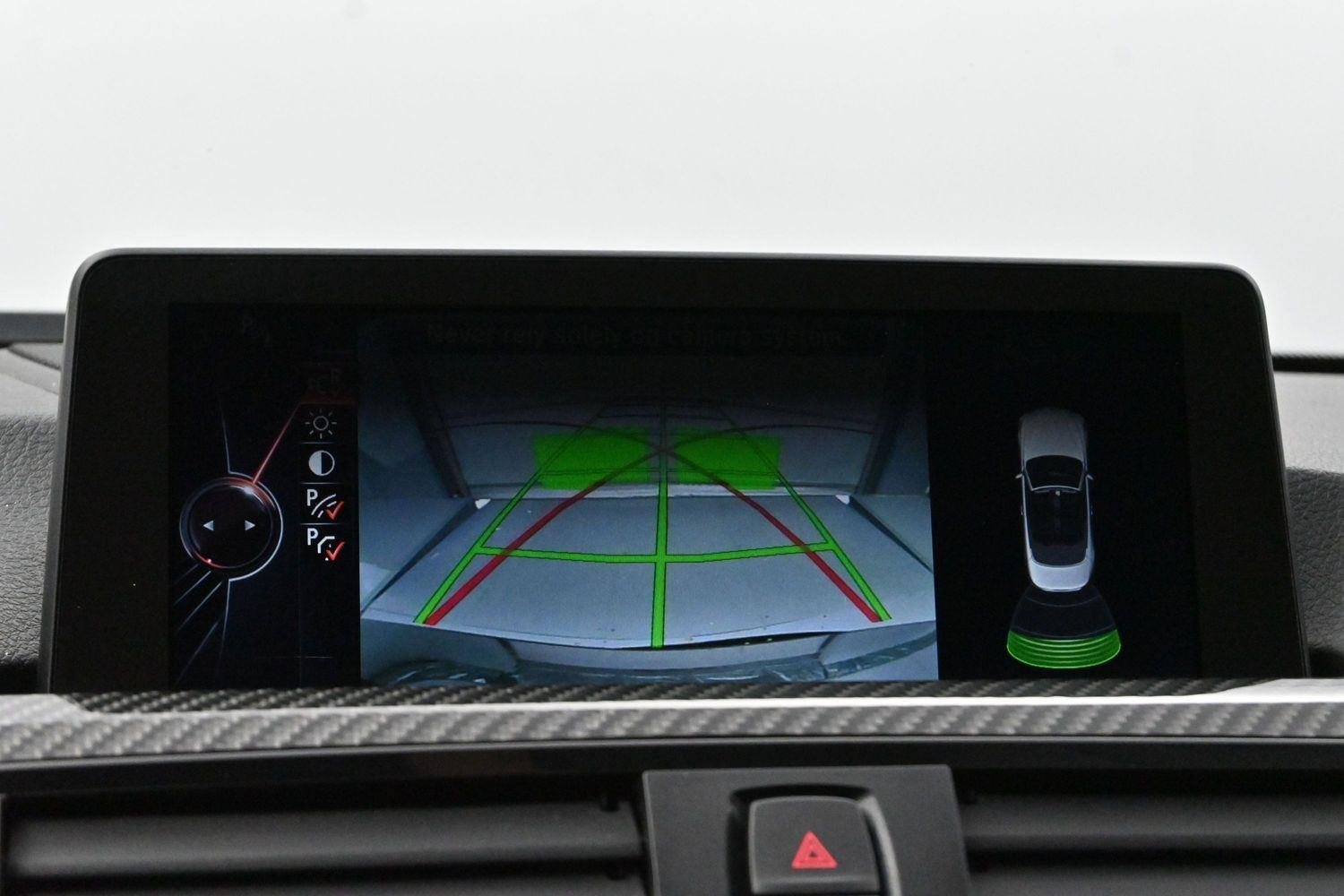 Used 2015 Black Sapphire Metallic BMW M4 image 22