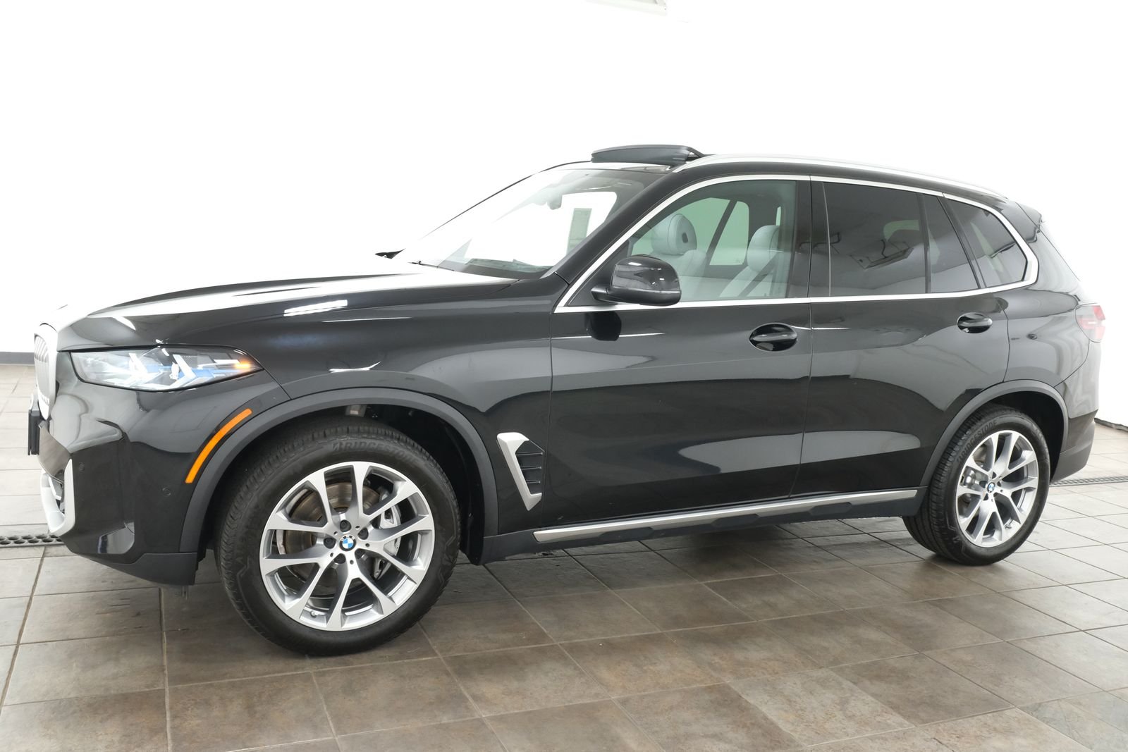 Certified Used 2024 Black Sapphire Metallic BMW xDrive40i image 2