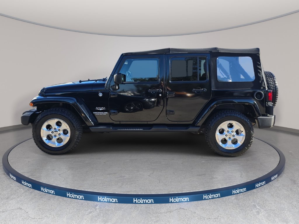 Used 2015 Black Jeep Unlimited Sahara image 9