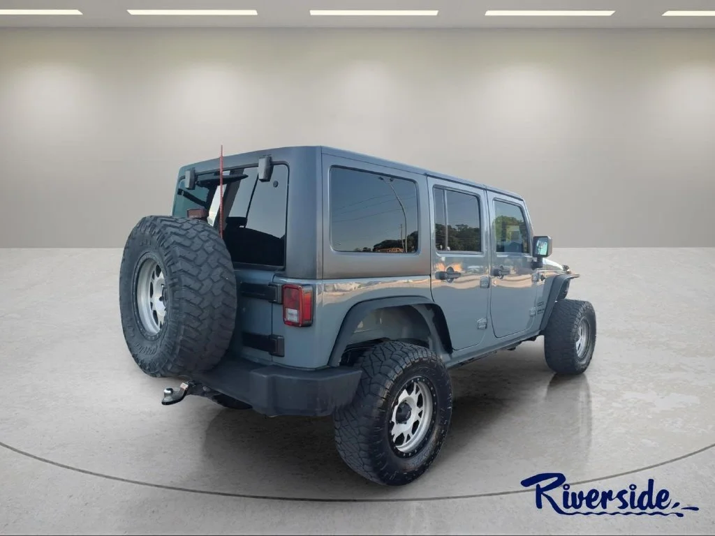 Used 2015 Gray Jeep Unlimited Sport image 2