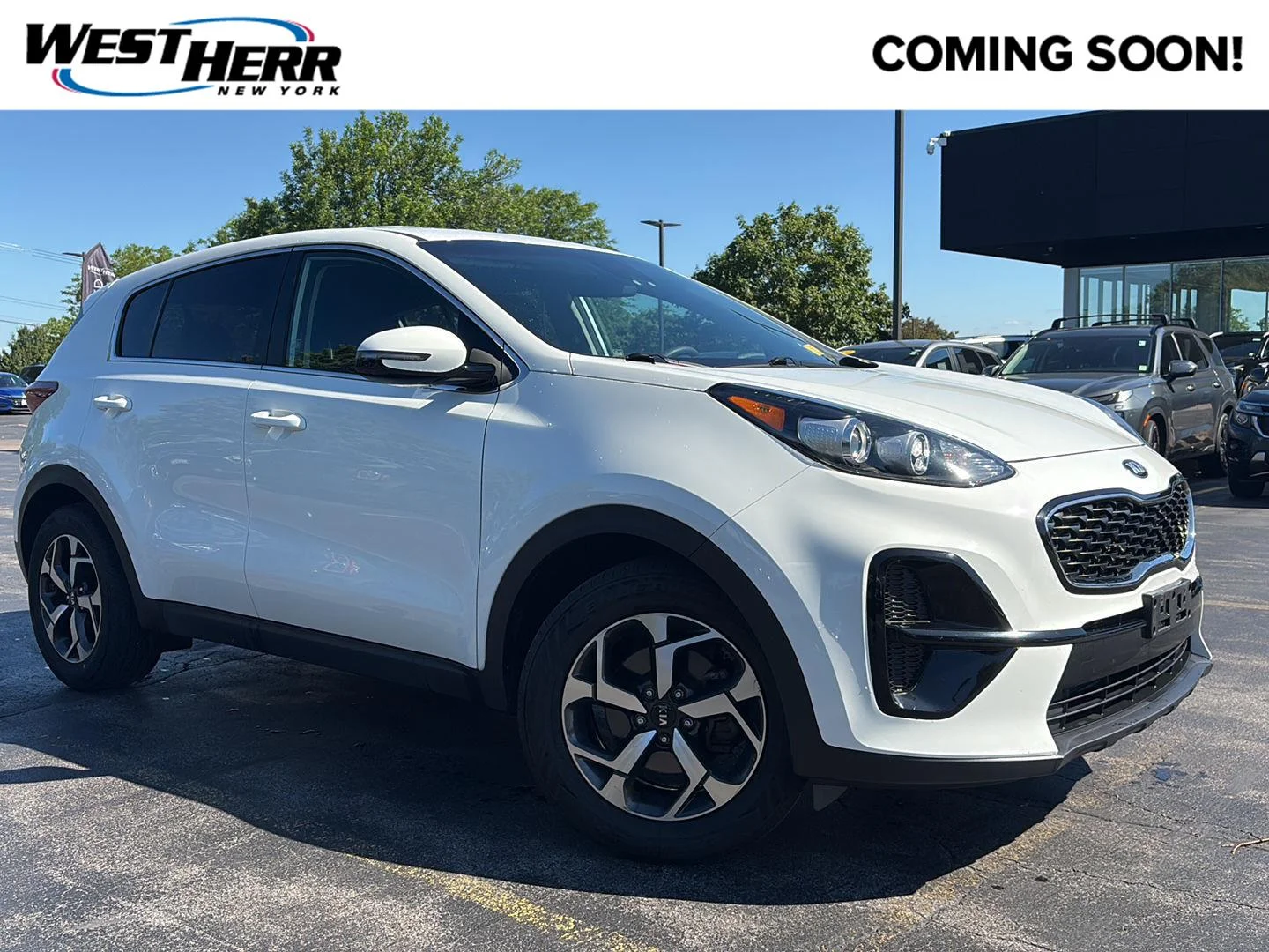 Used 2020 Clear White Kia LX image 1