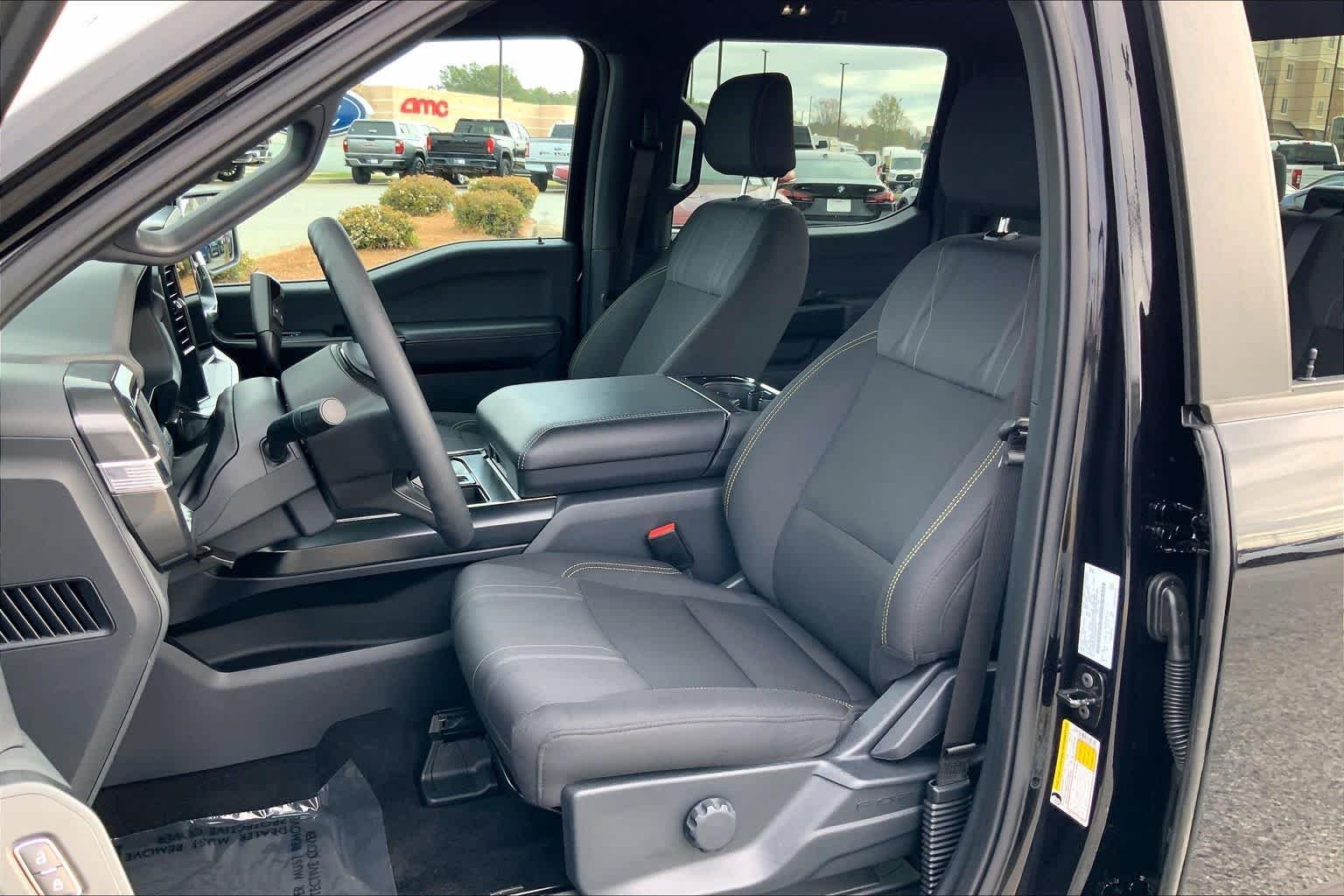 Used 2025 Agate Black Metallic Ford STX image 13