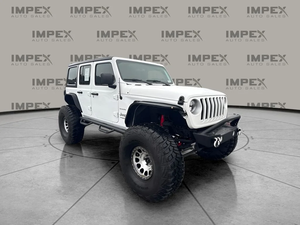 Used 2018 White Jeep Unlimited Sahara image 4