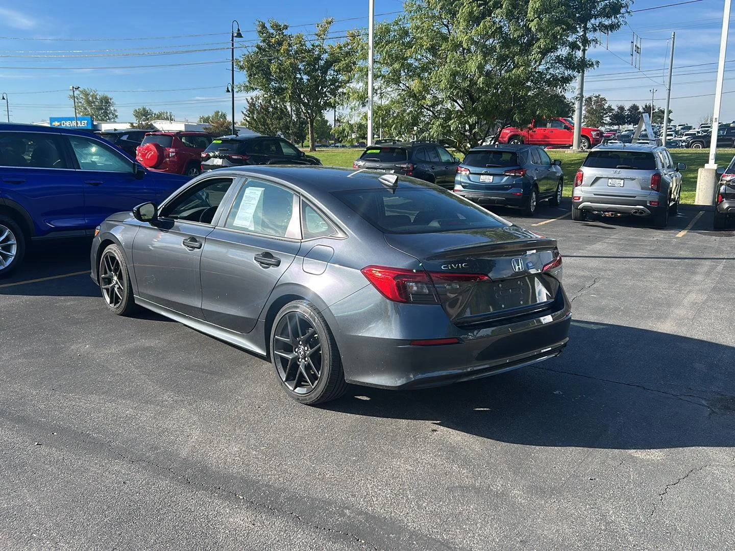 Used 2024 Meteorite Gray Metallic Honda Sport image 4