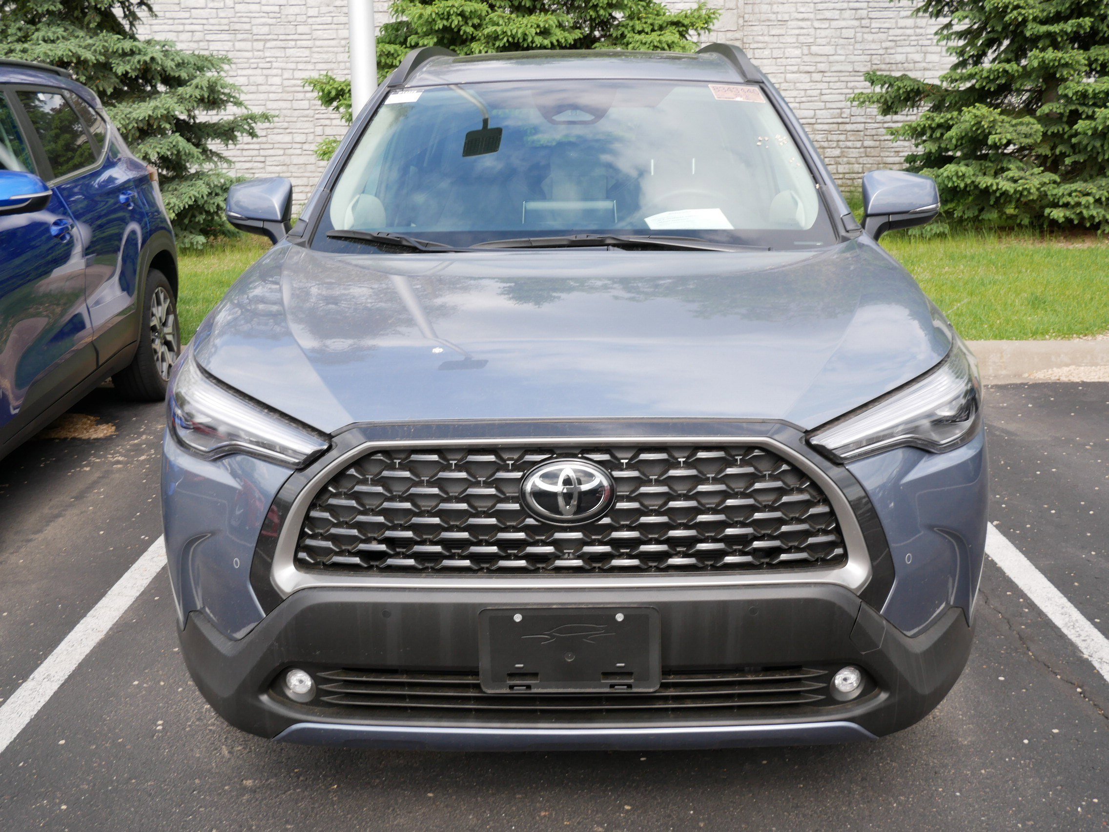 Used 2023 Toyota Corolla Cross XLE with VIN 7MUDAABG6PV078388 for sale in Brooklyn Center, Minnesota