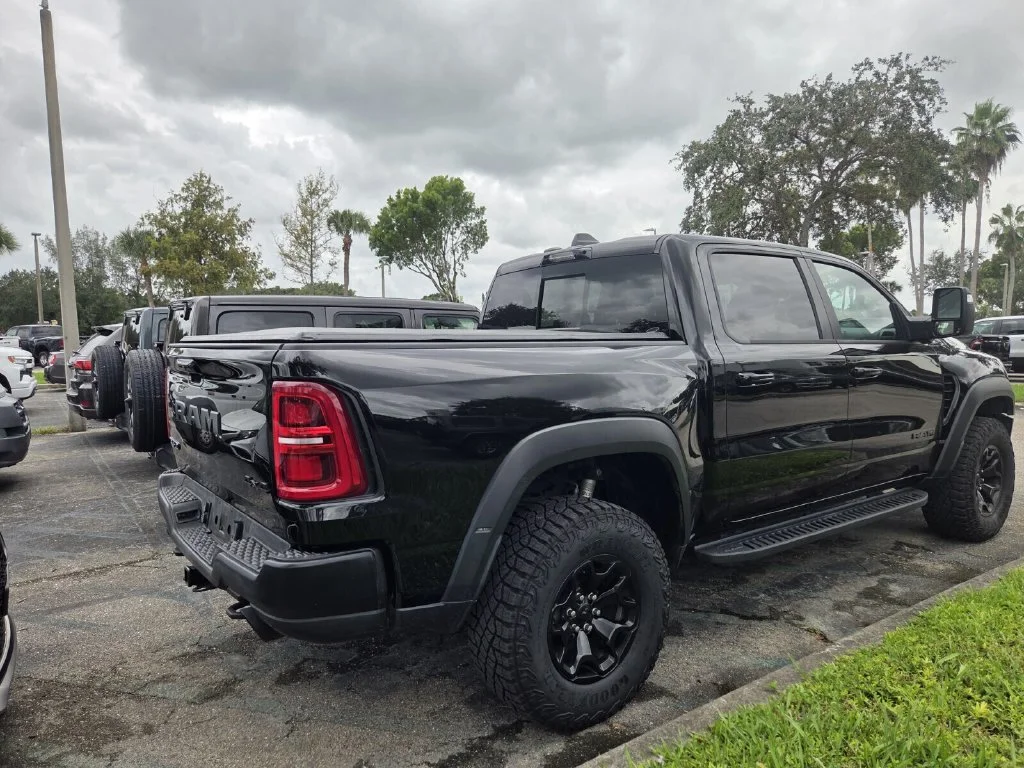 Used 2025 Diamond Black Crystal Pearlcoat Ram RHO image 5