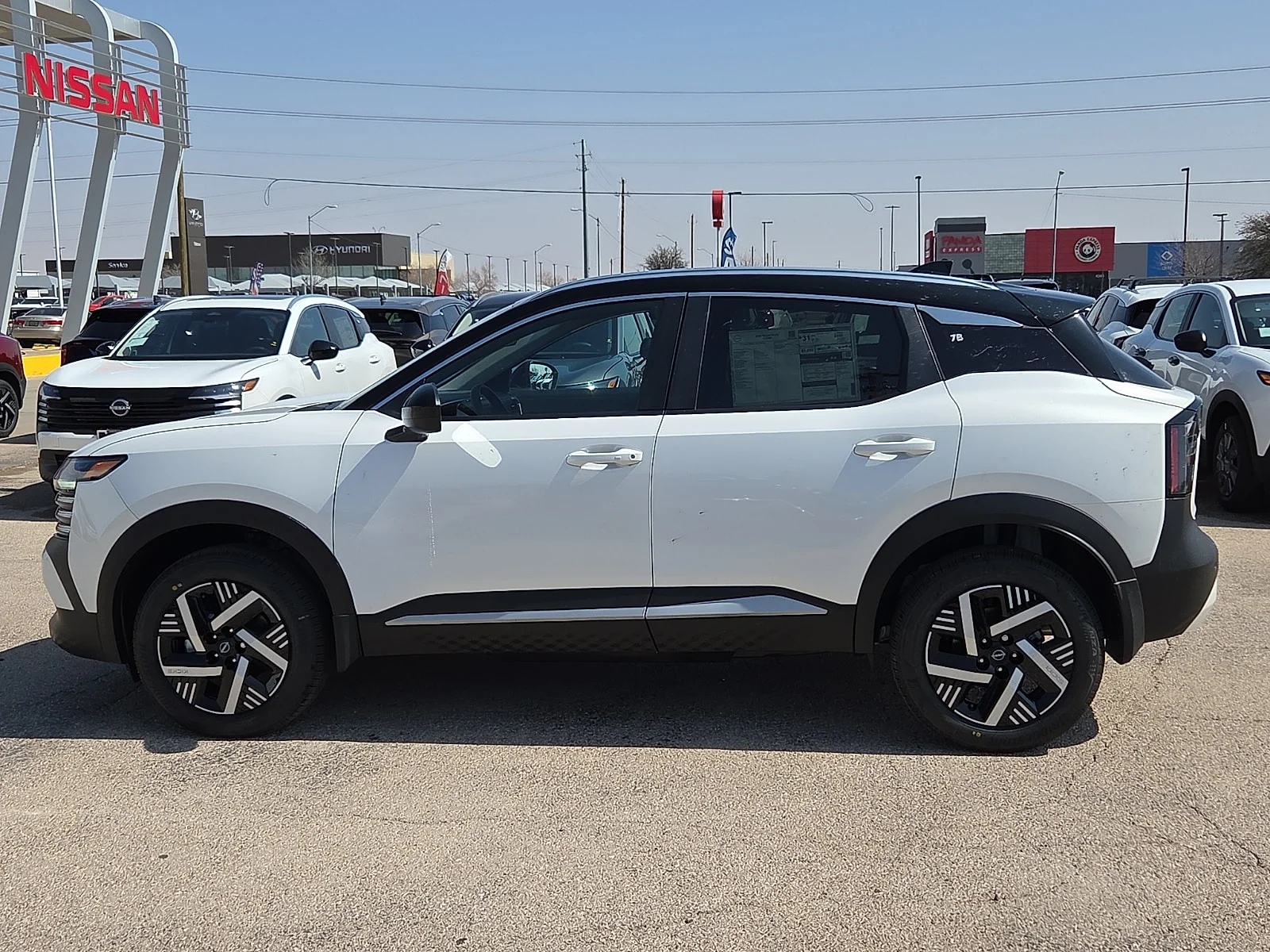 New 2026 XAB 2T White Black Nissan SV Front-Wheel Drive image 2