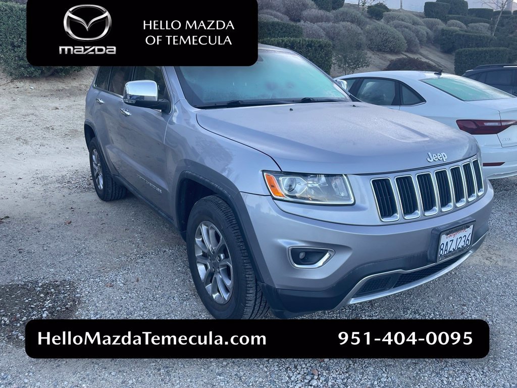 Used 2015 Billet Silver Metallic Jeep Limited image 1