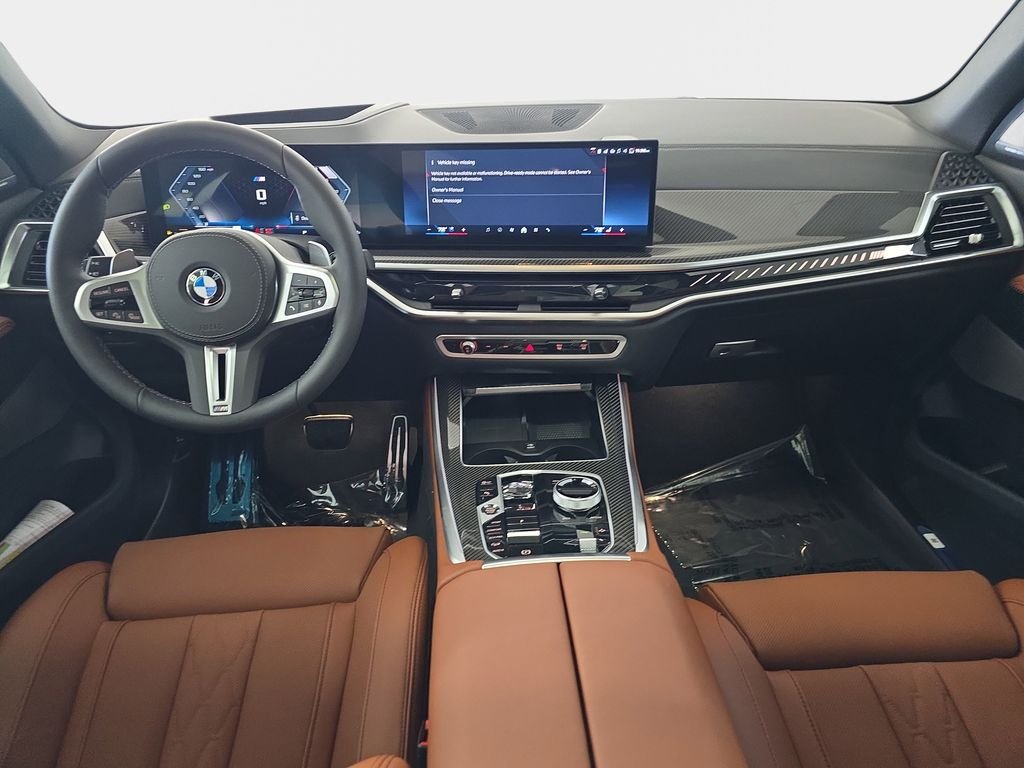 New 2026 Black Sapphire Metallic BMW M60i image 8