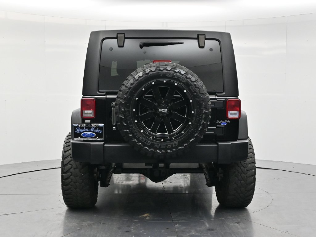 Used 2014 Black Clearcoat Jeep Unlimited Sport image 6
