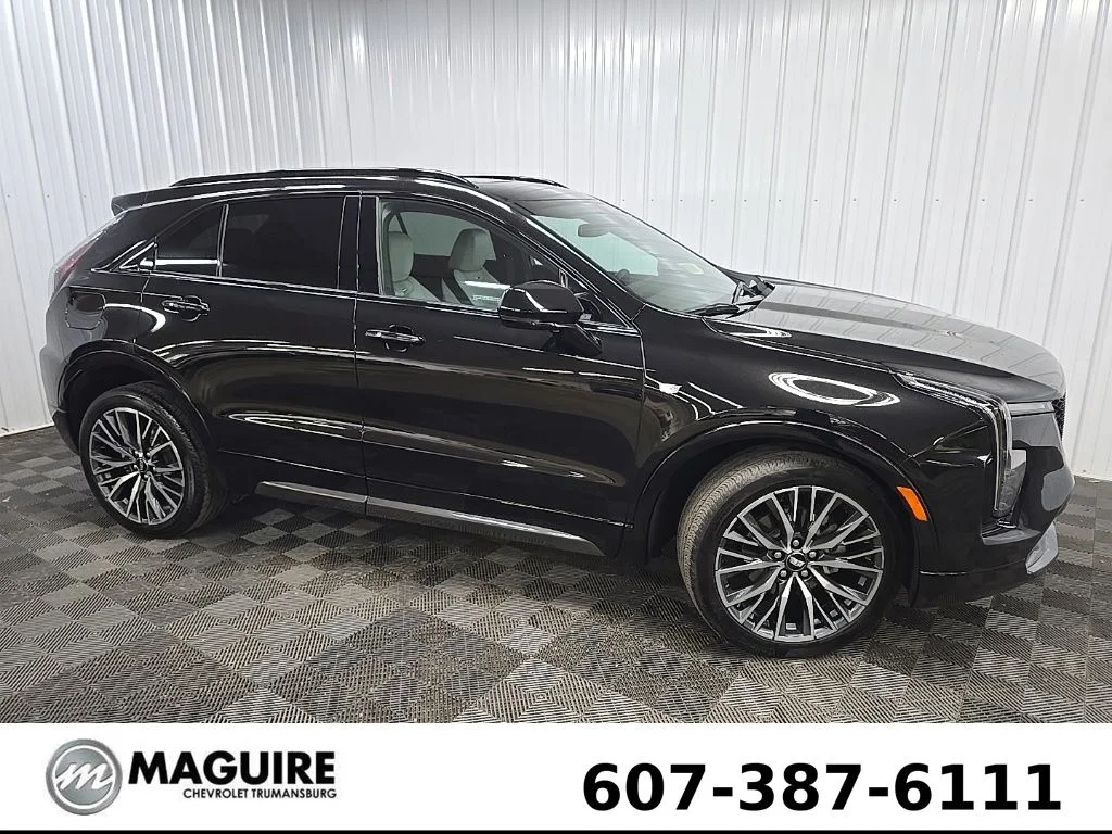 Used 2024 Black Cadillac Sport image 1
