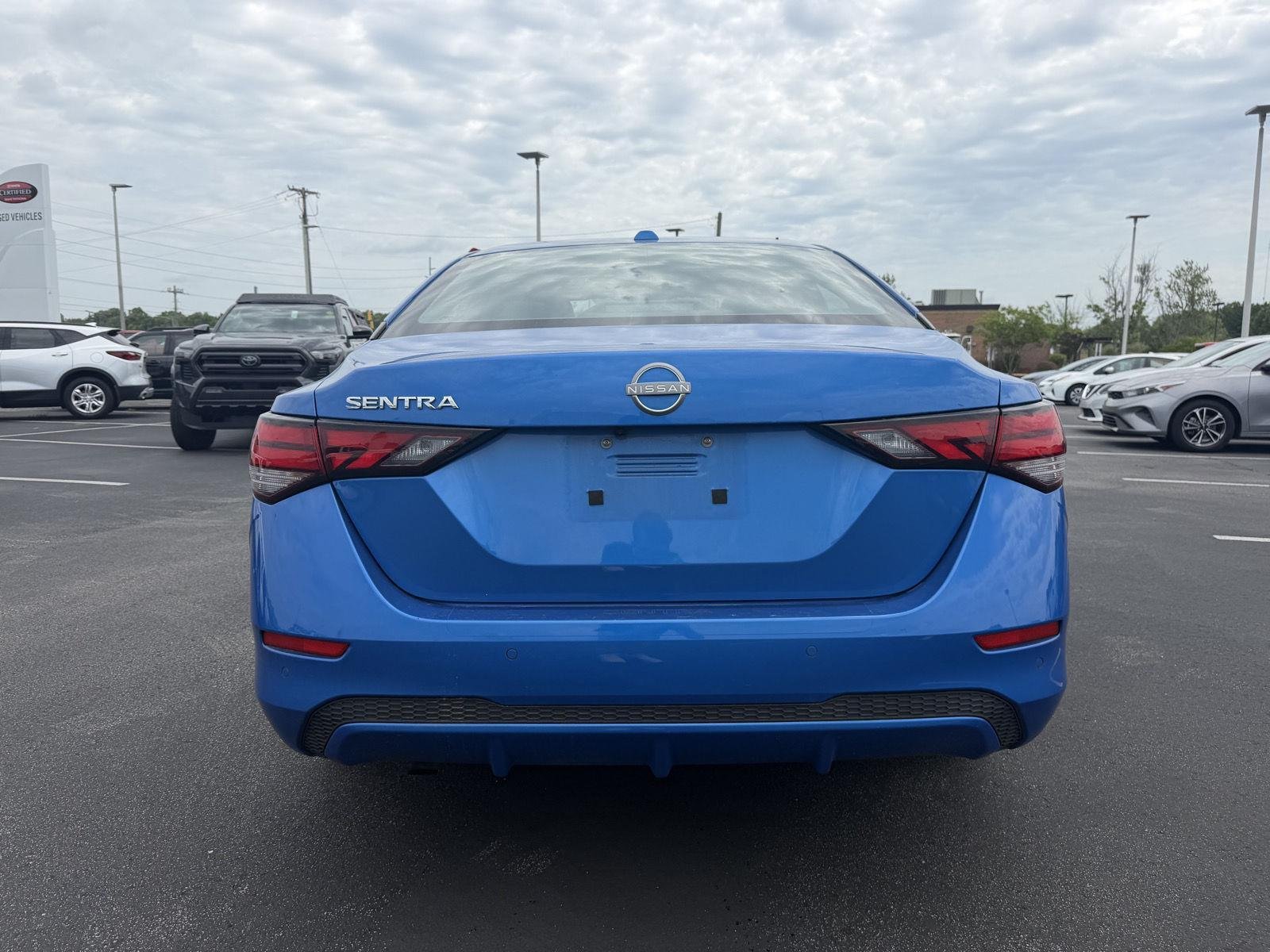 Used 2025 Electric Blue Metallic Nissan SV image 6