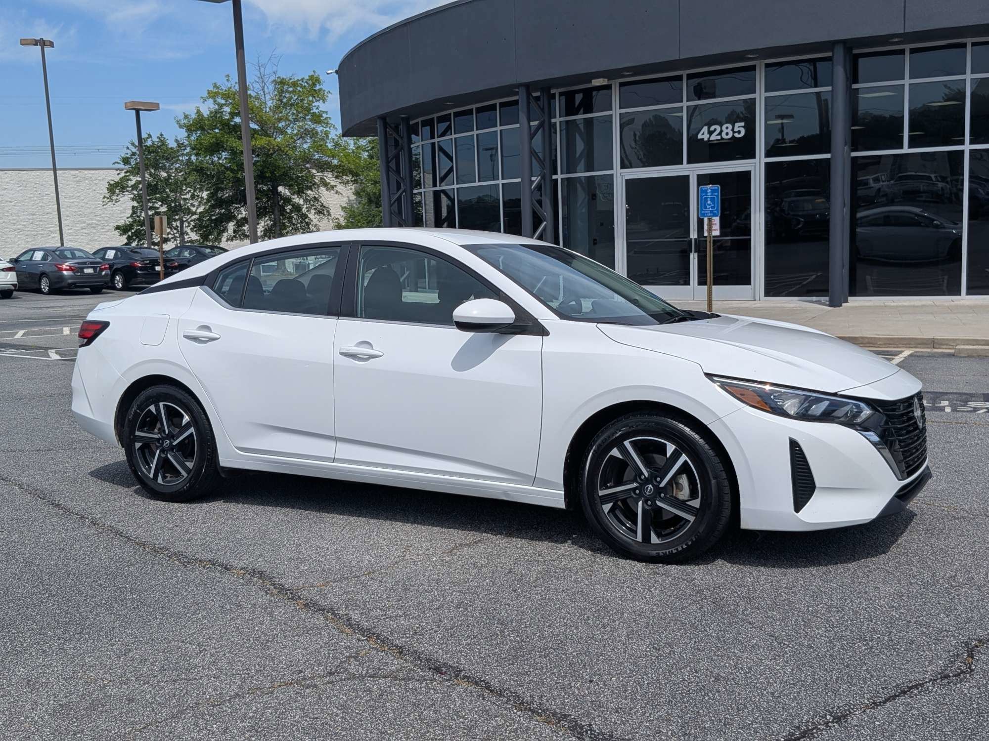 Used 2024 White Nissan SV image 1