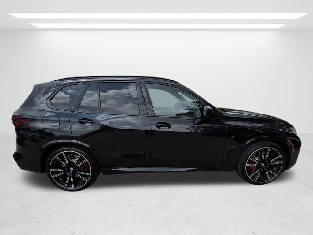 New 2026 Black Sapphire Metallic BMW M60i image 3
