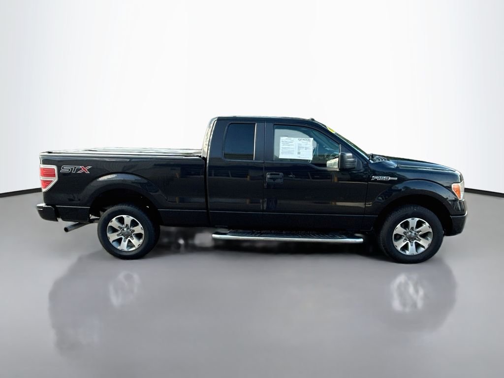 Used 2014 TUXEDO BLACK METALLIC Ford STX image 8
