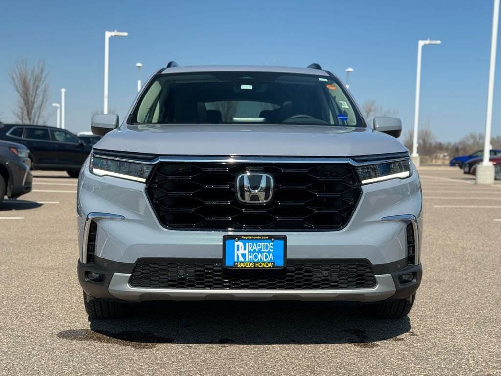 Certified 2025 Honda Pilot Touring with VIN 5FNYG1H7XSB185085 for sale in Coon Rapids, Minnesota