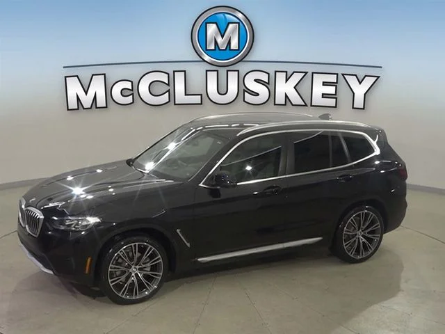 Used 2023 Black BMW xDrive30i image 1
