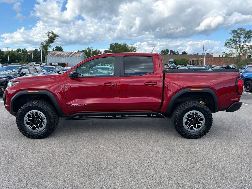 Used 2023 Red GMC AT4X image 4