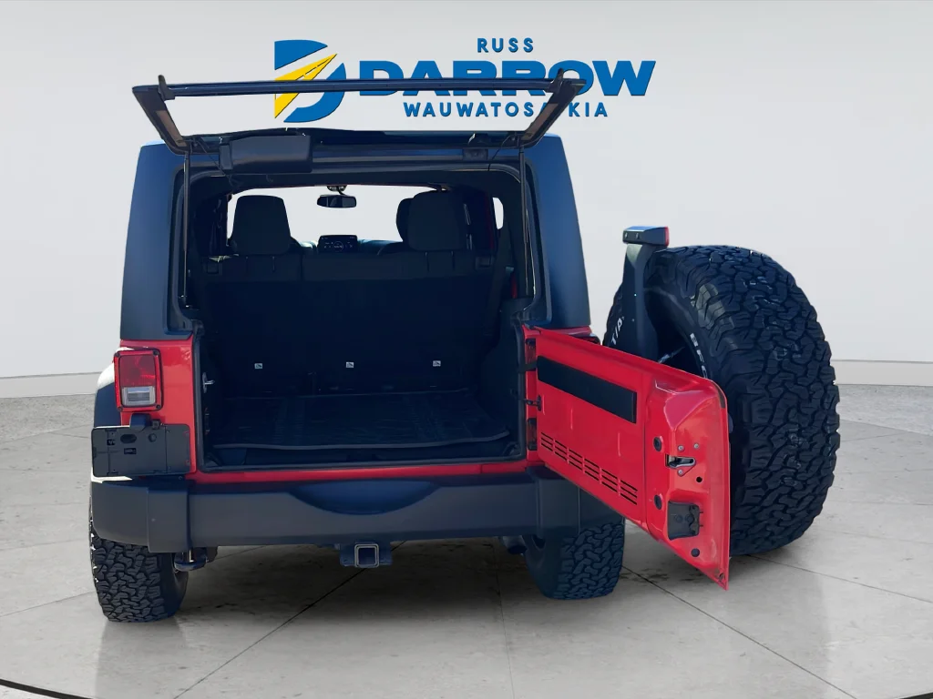 Used 2013 Red Jeep Unlimited Sport image 31