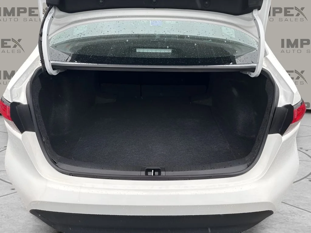 Used 2025 White Toyota LE image 25