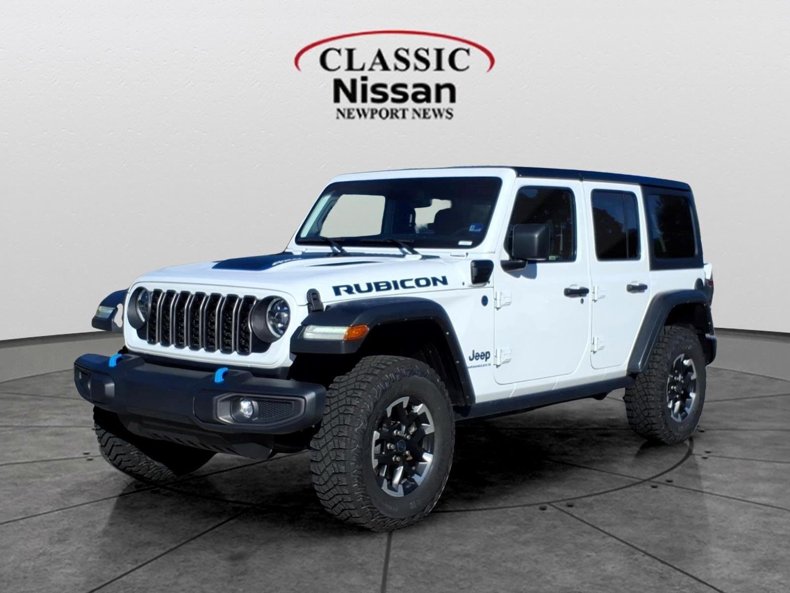 Used 2024 Bright White Clearcoat Jeep Rubicon image 1