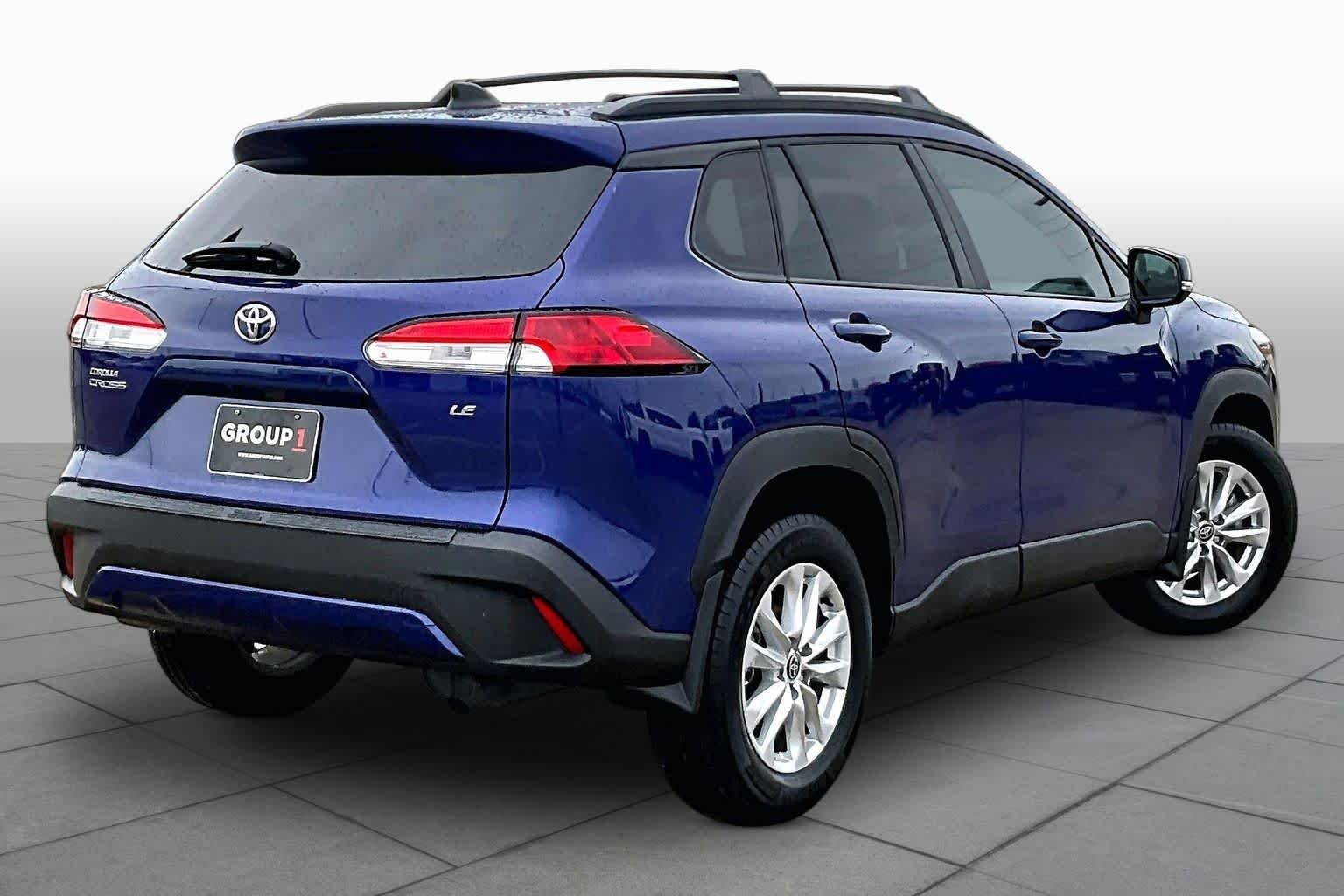 Used 2025 Blue Crush Metallic Toyota LE image 13