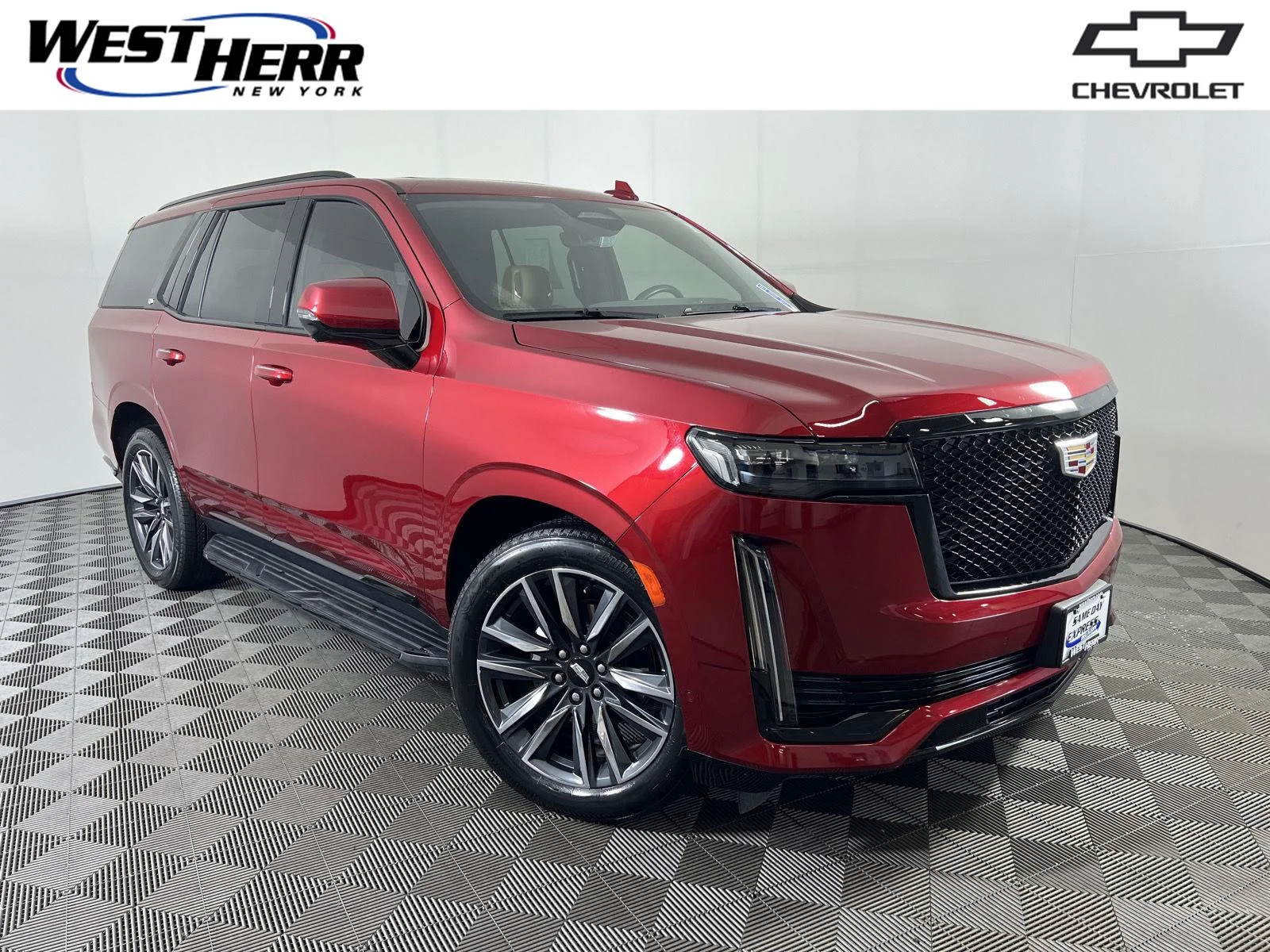 Used 2023 Radiant Red Tintcoat Cadillac Sport image 1