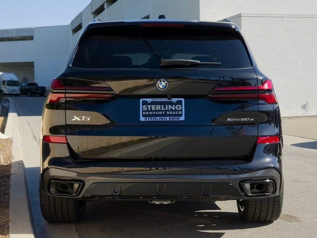 New 2026 Black Sapphire Metallic BMW xDrive50e image 6