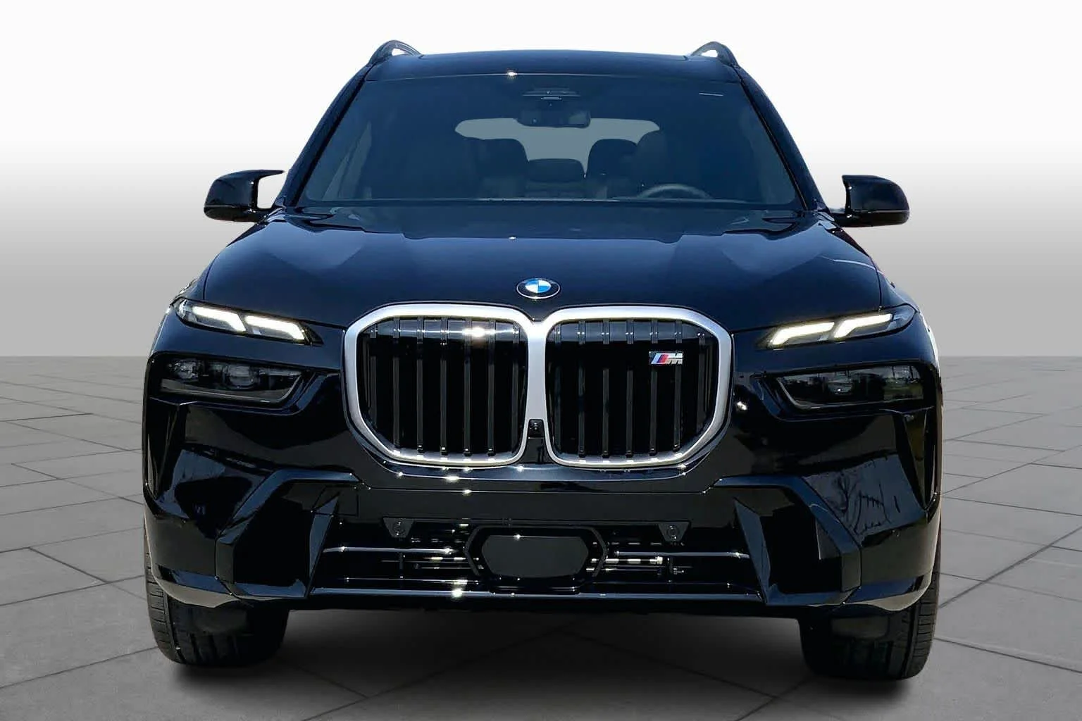 New 2026 Black Sapphire Metallic BMW M60i image 3