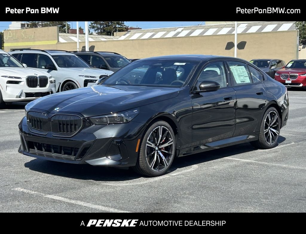 New 2027 Black Sapphire Metallic BMW 540i xDrive image 1