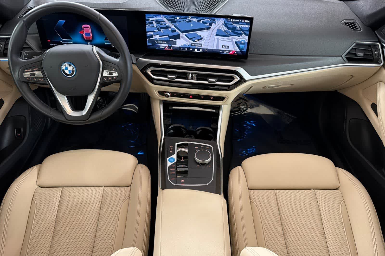 Used 2024 Sunset Orange Metallic BMW eDrive40 image 3