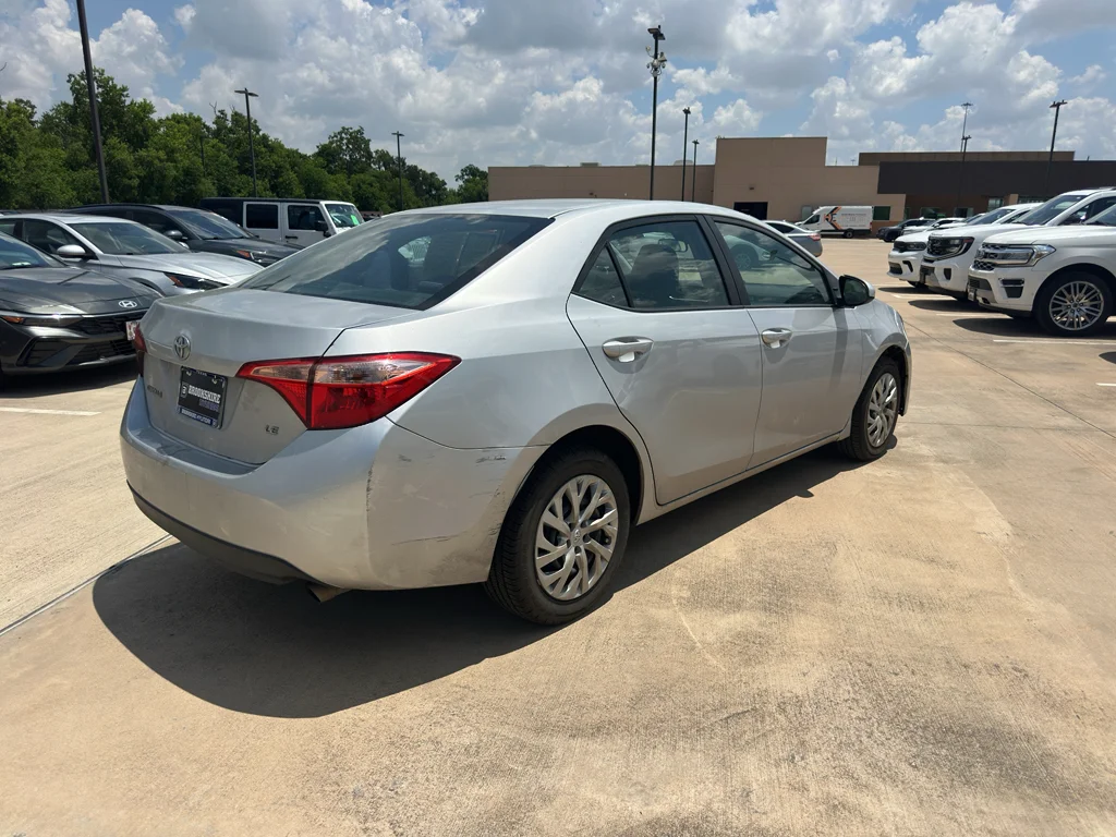 Used 2019 Classic Silver Metallic Toyota LE image 5