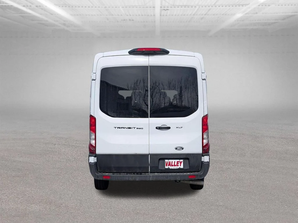 New 2026 Oxford White Ford Passenger Van XLT image 10