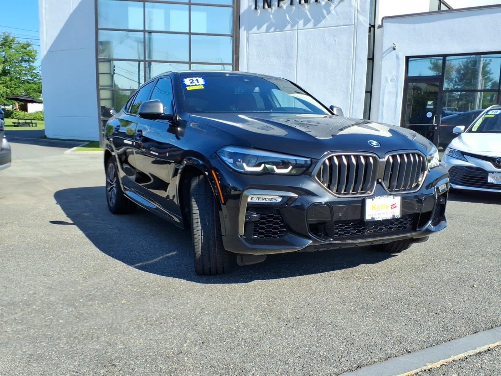 Used 2021 Black Sapphire Metallic BMW M50i image 3
