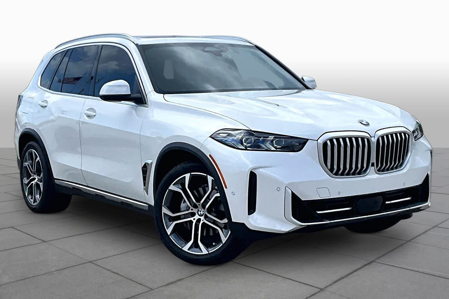 Used 2026 Mineral White Metallic BMW xDrive40i image 4
