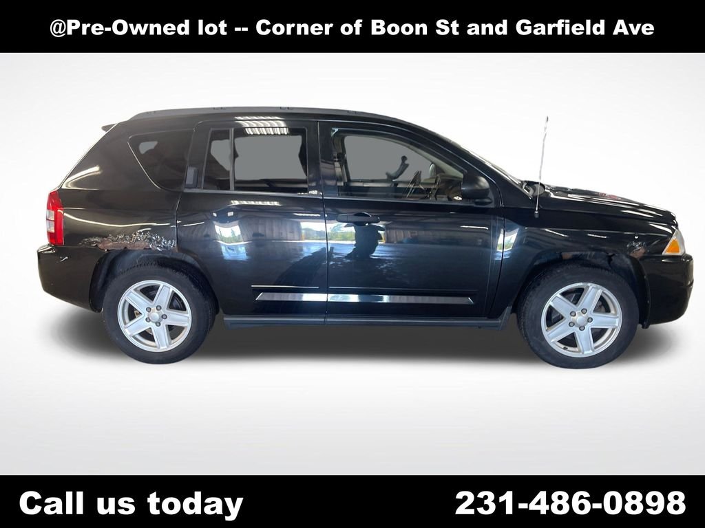 Used 2009 Black Jeep Sport image 6