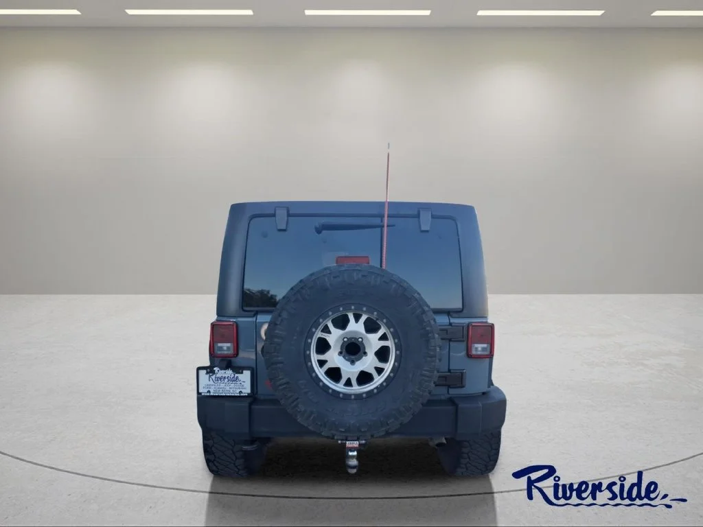 Used 2015 Gray Jeep Unlimited Sport image 3