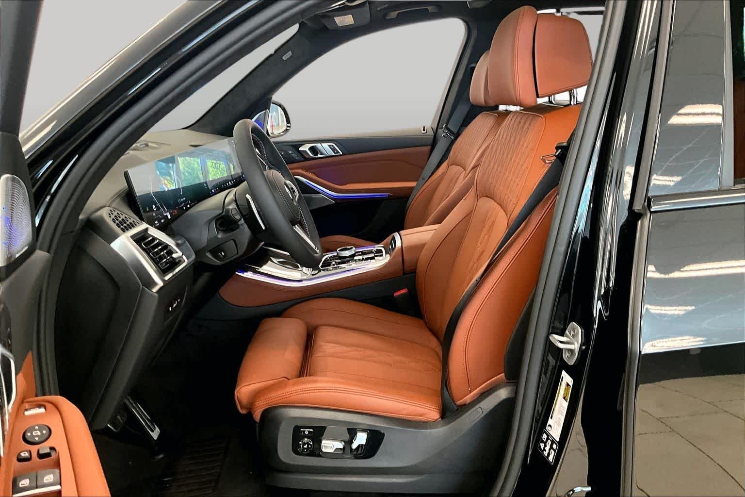 Used 2026 Black Sapphire Metallic BMW M60i image 7