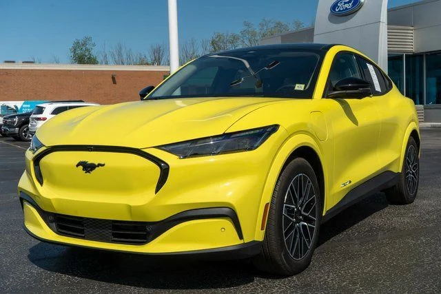 Used 2025 Yellow Ford Premium image 2