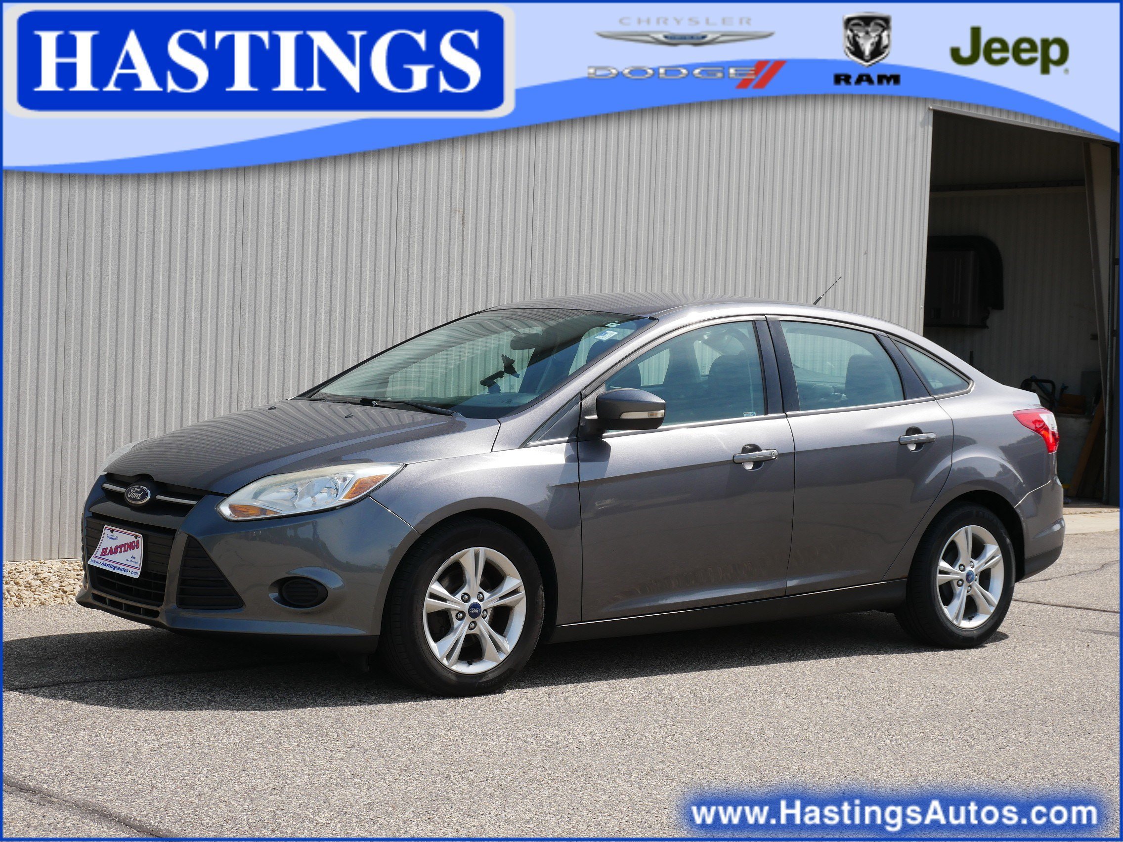 Used 2013 Gray Ford SE image 1