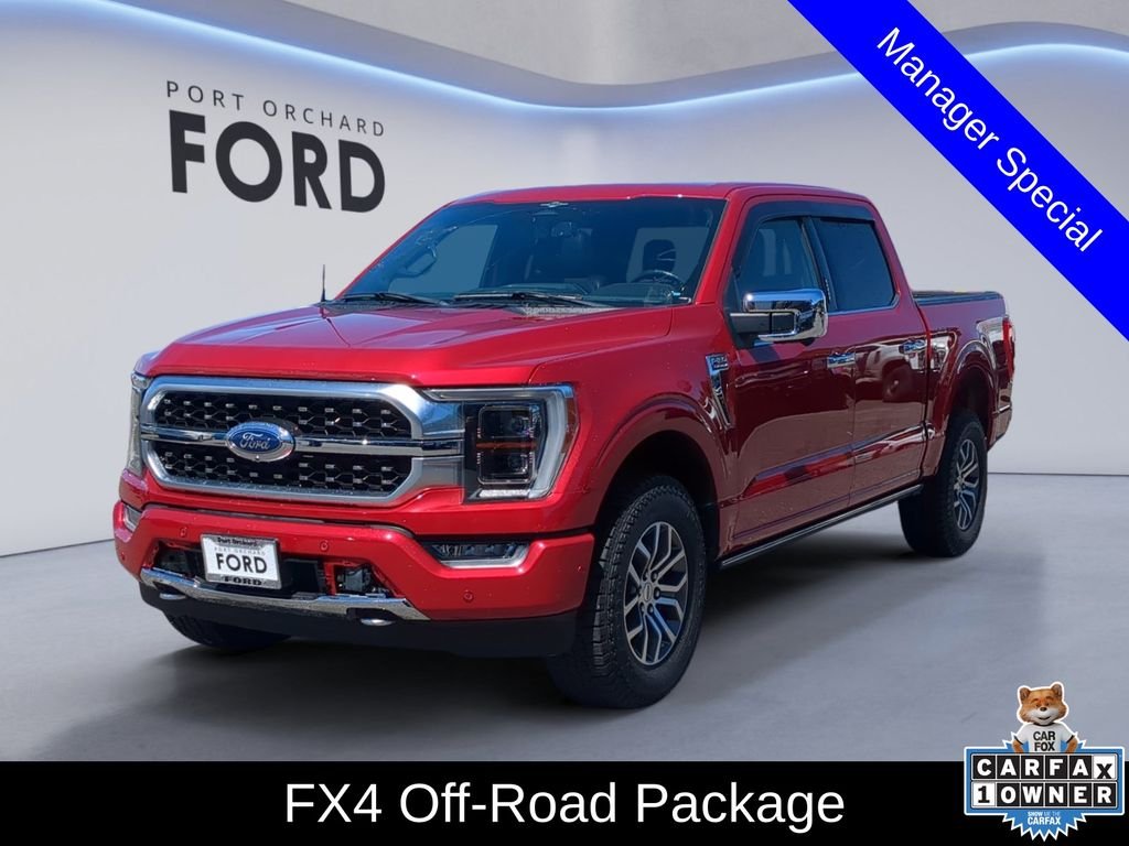 Used 2023 Red Metallic Ford Platinum image 1