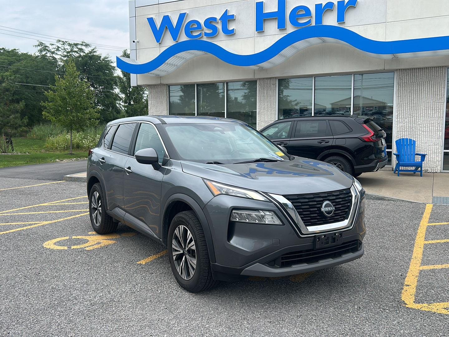 Used 2023 Gun Metallic Nissan SV image 1